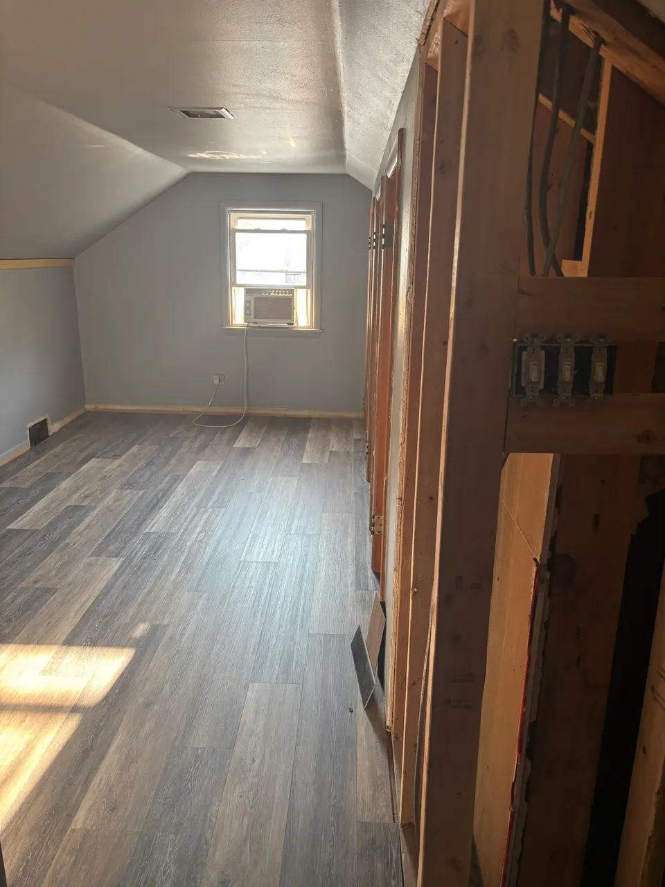 New vinyl plank flooring in a remodeled room