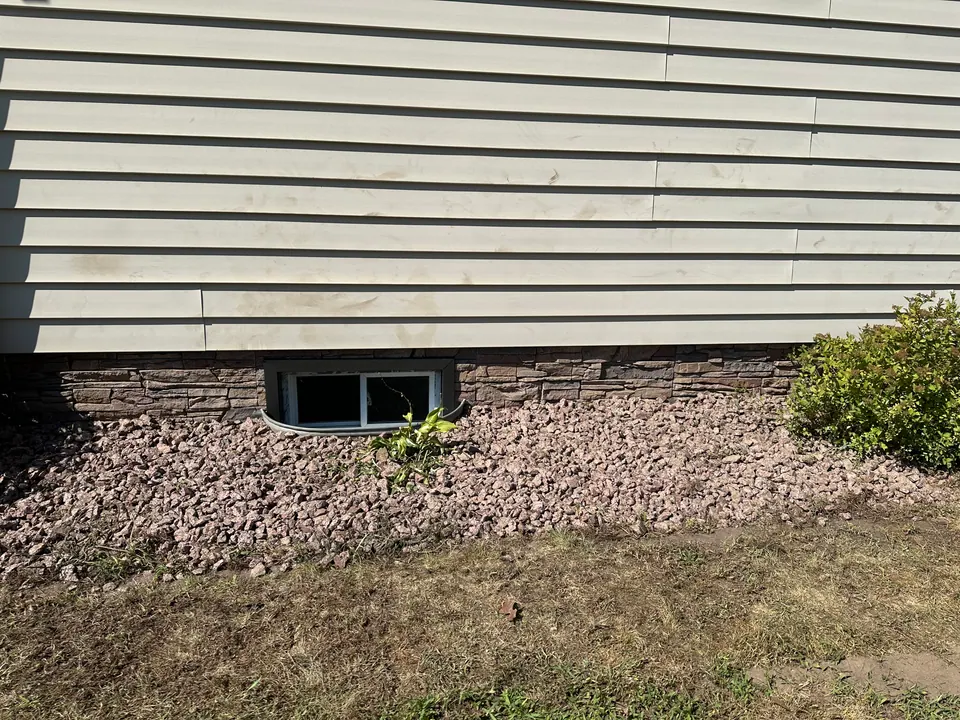 Vinyl siding and foundation trim detail